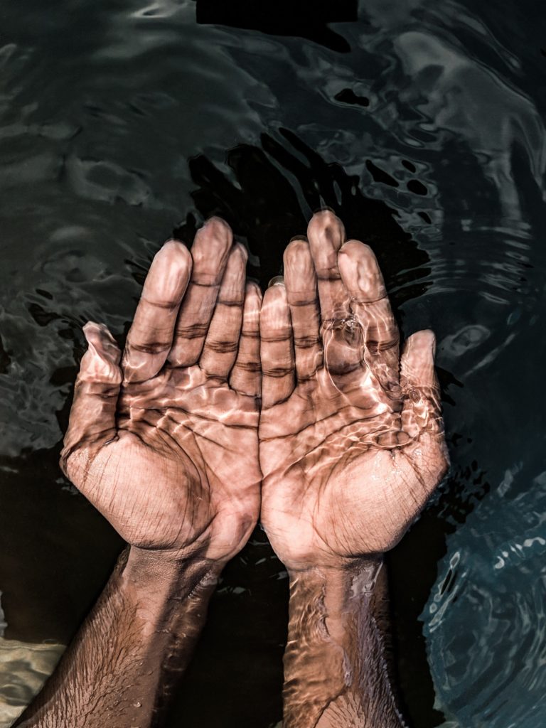 hands underwater